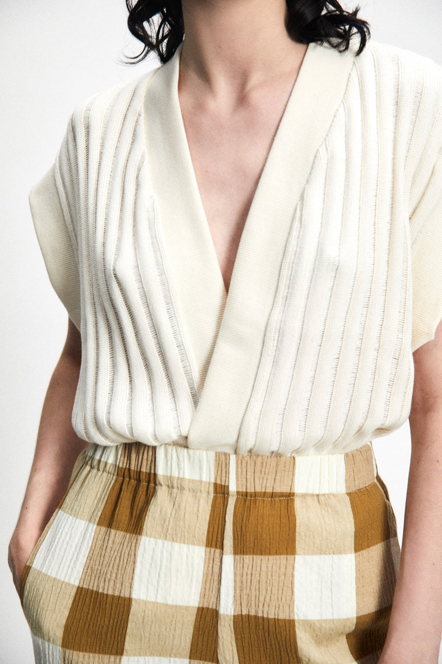 close up 100% cotton vest/top with Japanese short sleeves in slightly sheer loose rib knit fabric.