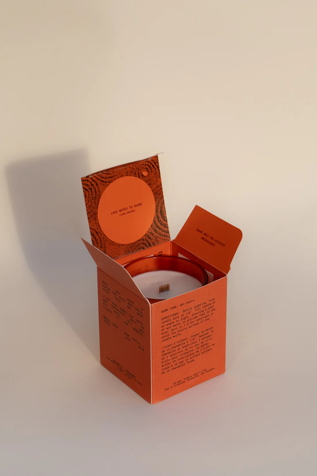 open candle box with love notes on the inside folds