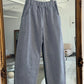 striped blue and white 100% cotton pant with elastic waist, curved leg, side panels and pockets