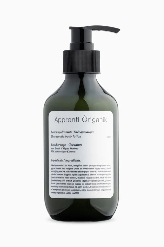 A pump bottle of Apprenti Organik body lotion with labels indicating Egyptian Geranium & Blood Orange body lotion, therapeutic non-greasy formula, and enriched with active natural ingredients.