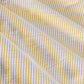 Close-up of yellow and white striped seersucker cotton fabric