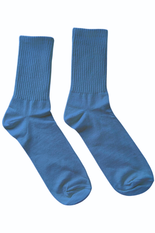 Pair of blue socks on a white background