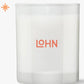 White candle with 'LOHN' logo on a white background