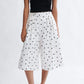 Woman wearing the Frances Short in cookies and cream polka dot tencel twill by Eliza Faulkner — ethical women's shorts at Ånde slow fashion store