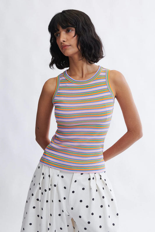 Woman wearing the Linnea fitted ribbed tank top in pink stripe by Eliza Faulkner — ethically made in Canada, available at Ånde