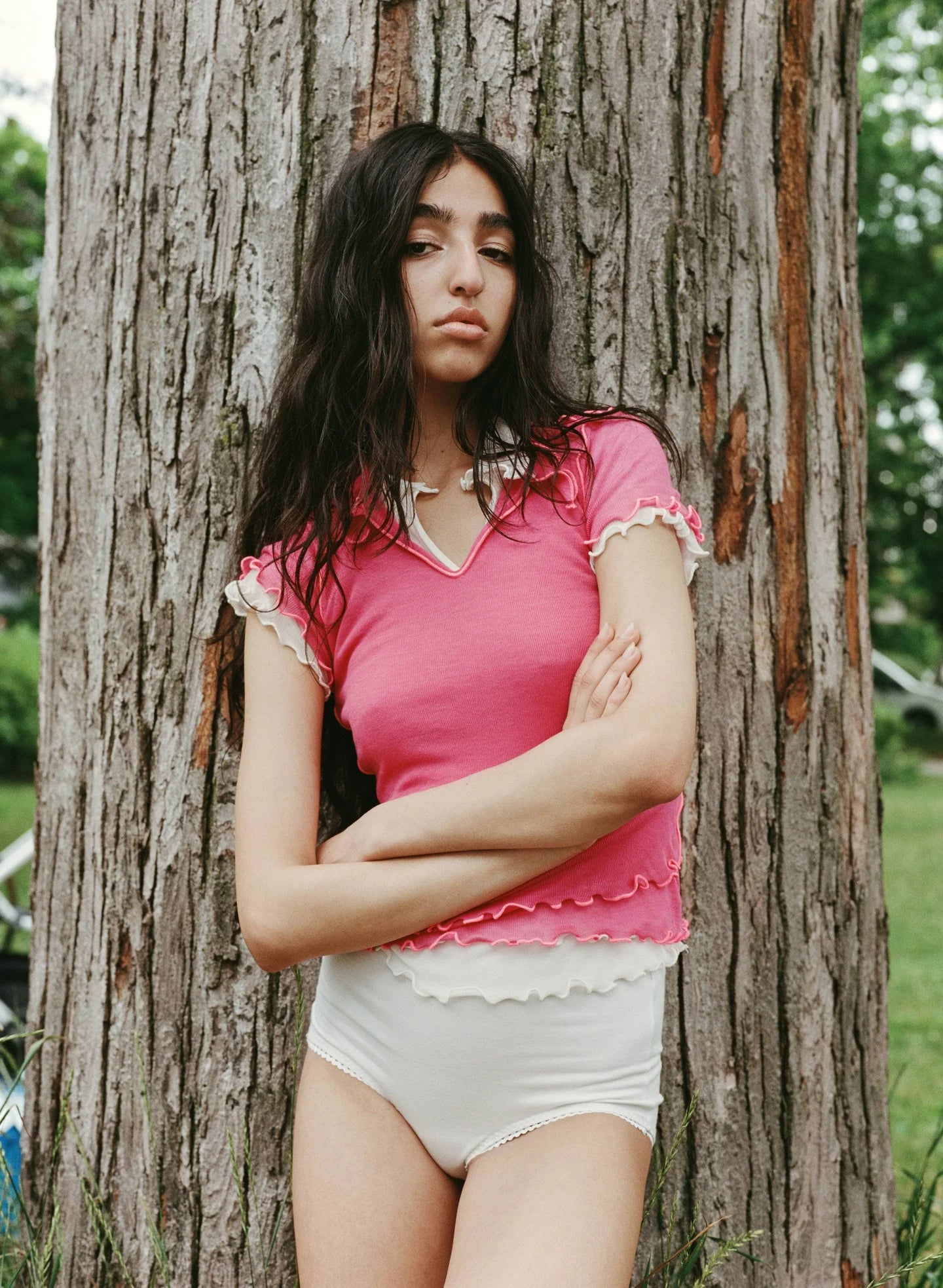 
Percy Polo Top in raspberry styled as a layering piece by Eliza Faulkner — sustainable women's fashion at Ånde