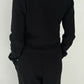 Back view of Le Bon Shoppe Waffle Fundamental Tee in true black showing heavyweight waffle cotton texture across back and sleeves, styled as a set with the Waffle Lo Pants
